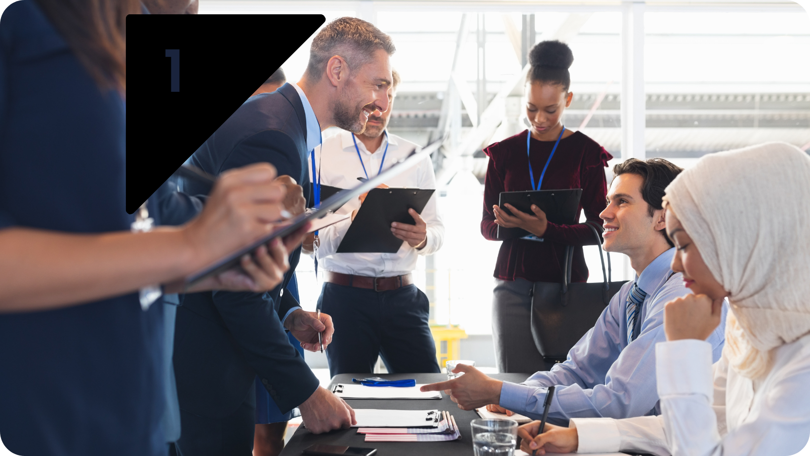 Man checking in at a registration desk at an event.