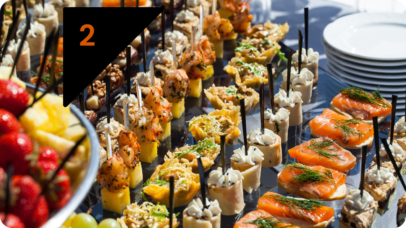 Lines of canapes including seafood and fresh vegetables